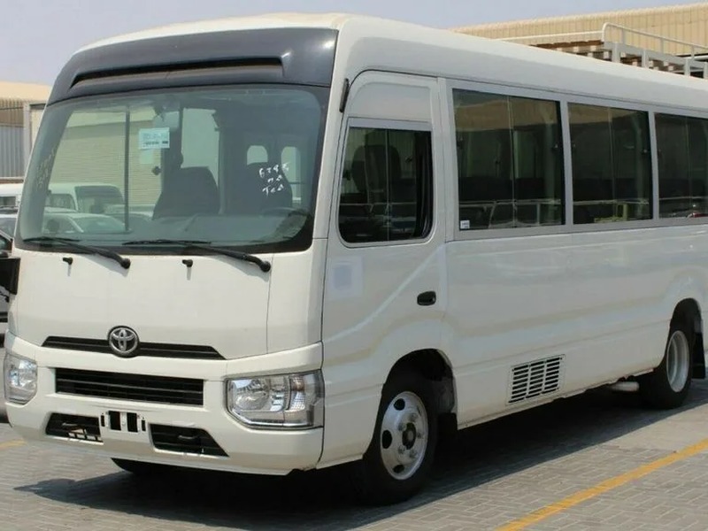 Toyota Coaster for Ziyarat taxi tour up to 16 passengers